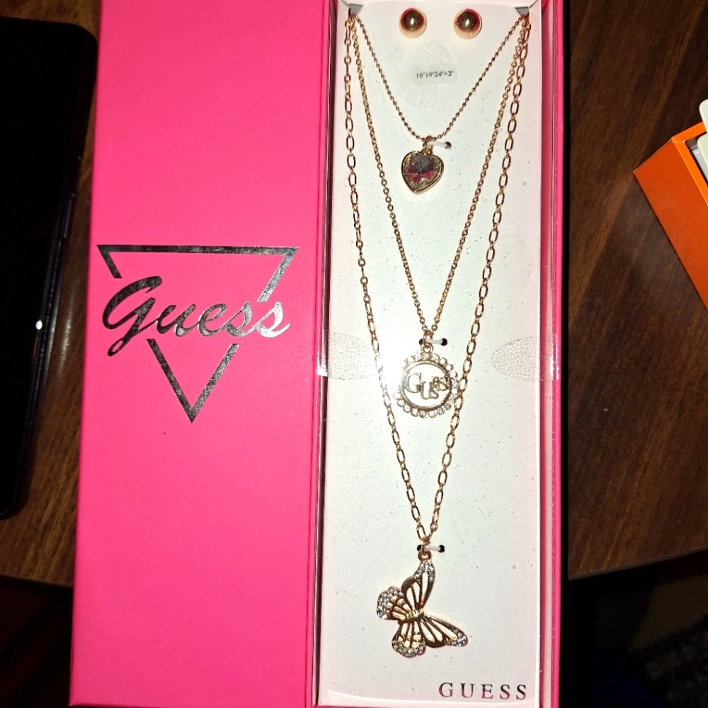 Guess necklace set plus 7 more.
